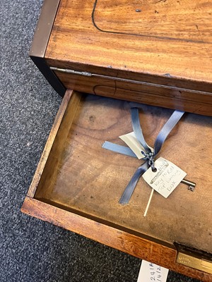 Lot 241 - A camphor and brass campaign writing box
