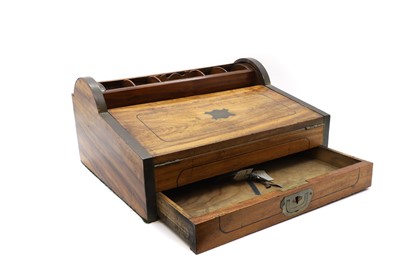 Lot 241 - A camphor and brass campaign writing box