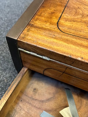 Lot 241 - A camphor and brass campaign writing box
