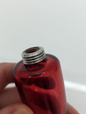 Lot 41 - A Victorian silver-mounted glass scent bottle