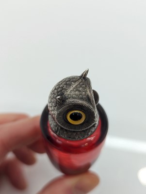 Lot 41 - A Victorian silver-mounted glass scent bottle