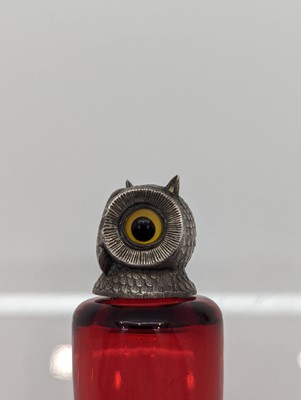 Lot 41 - A Victorian silver-mounted glass scent bottle