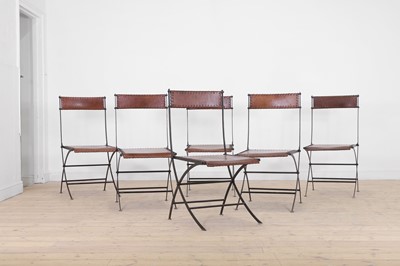 Lot 204 - A set of six iron and leather folding chairs