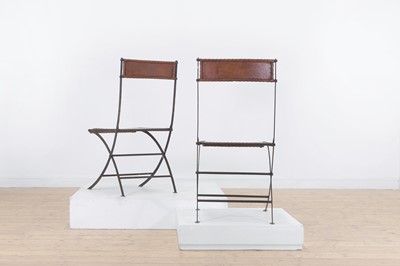 Lot 204 - A set of six iron and leather folding chairs