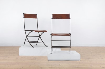 Lot 204 - A set of six iron and leather folding chairs