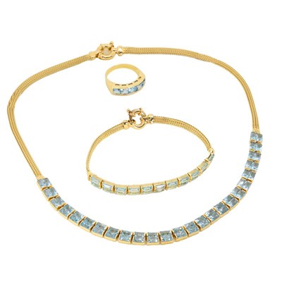 Lot 189 - A gold and blue topaz jewellery suite