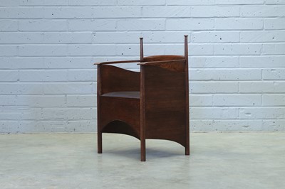 Lot 114 - An oak armchair