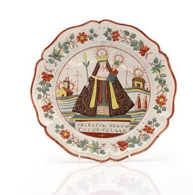 Lot 192 - An 'Our Lady to Kevelaar' creamware plate