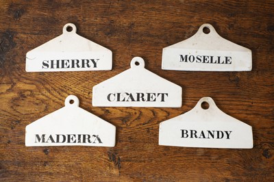 Lot 133 - A group of five ceramic wine bin labels