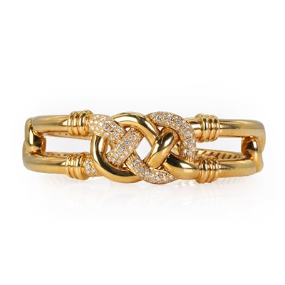 Lot 125 - An 18ct gold and diamond bangle, by Asprey