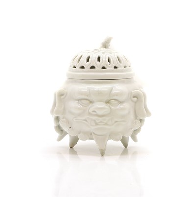 Lot 244 - A Blanc de Chine porcelain pot pourri