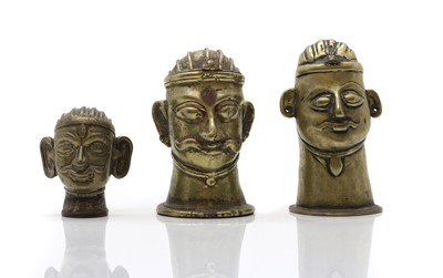 Lot 59 - A group of three Shiva Mukhalingam brass alloy figures