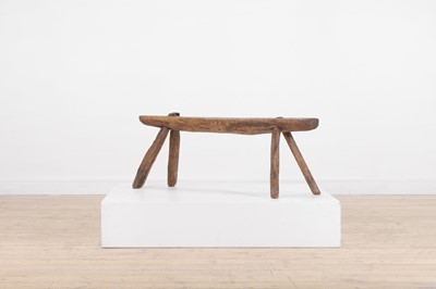 Lot 505 - A vernacular elm pig bench