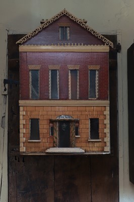 Lot 504 - A William IV painted wooden doll's house