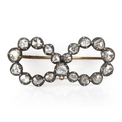 Lot 2 - A Georgian graduated rose cut diamond bow loop brooch