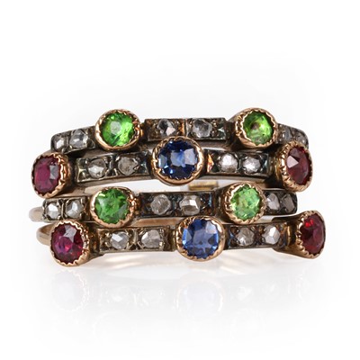 Lot 42 - An Edwardian demantoid garnet, ruby, sapphire, and diamond Harem ring, c.1905