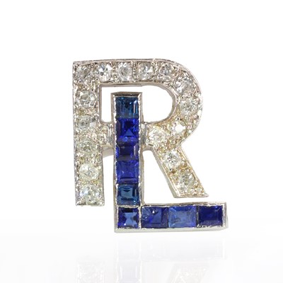 Lot 67 - An Art Deco sapphire and diamond monogram