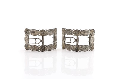 Lot 97 - A pair of bright-cut pewter shoe buckles