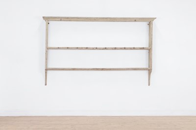 Lot 609 - A painted pine plate rack