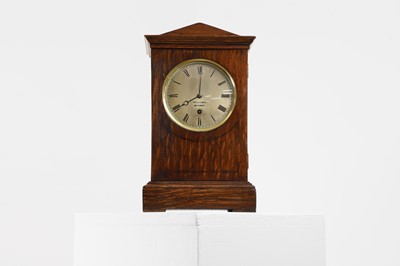 Lot 271 - A Regency oak-cased mantel clock