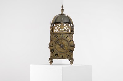 Lot 290 - A brass lantern clock