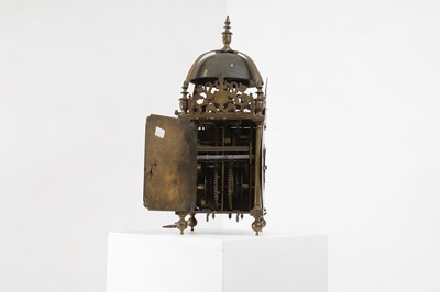 Lot 290 - A brass lantern clock
