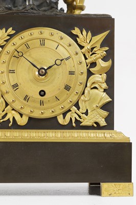Lot 352 - An Empire-style patinated and gilt-bronze mantel clock