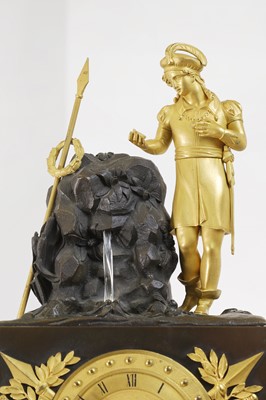 Lot 352 - An Empire-style patinated and gilt-bronze mantel clock