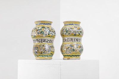 Lot 234 - A pair of maiolica armorial albarelli