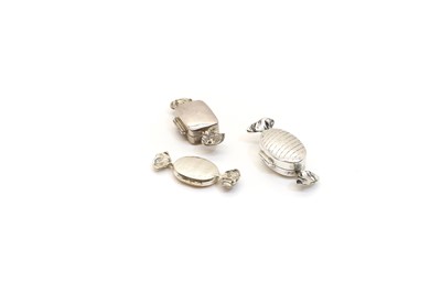Lot 55 - A group of three silver pill boxes