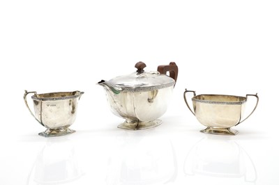 Lot 11 - A three piece silver tea service