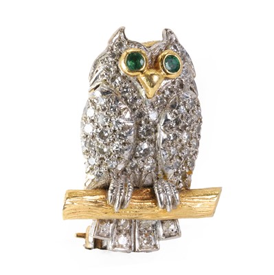 Lot 177 - A two colour gold diamond and emerald novelty brooch