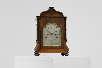 Lot 284 - A rosewood library clock