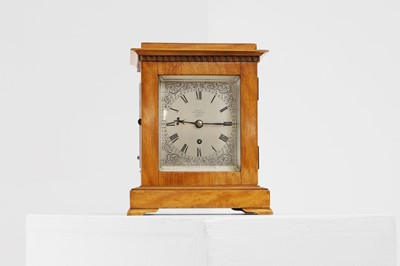 Lot 286 - A satinwood library clock