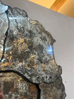 Lot 526 - An etched glass mirror