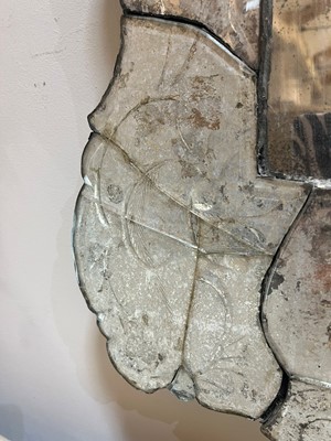 Lot 526 - An etched glass mirror