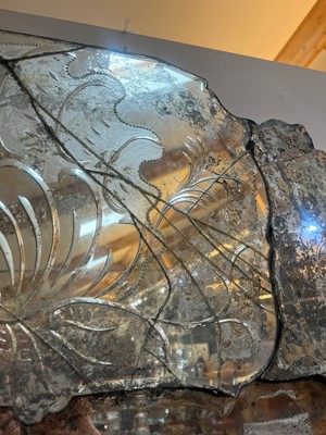 Lot 526 - An etched glass mirror