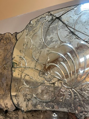 Lot 526 - An etched glass mirror