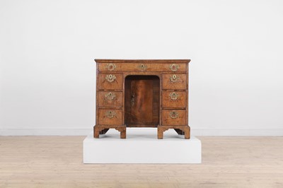 Lot 360 - A George II walnut kneehole desk