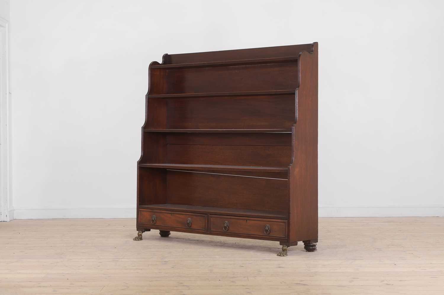 Lot 462 - A large Regency mahogany waterfall bookcase