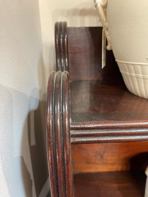 Lot 462 - A large Regency mahogany waterfall bookcase