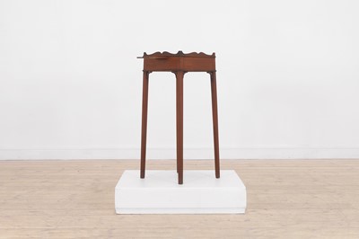 Lot 323 - A George III mahogany urn stand
