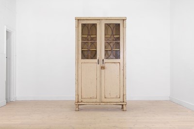 Lot 476 - A painted pine cupboard