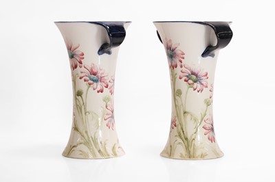 Lot 130 - A pair of William Moorcroft 'Daisy' vases