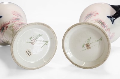 Lot 130 - A pair of William Moorcroft 'Daisy' vases