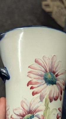 Lot 130 - A pair of William Moorcroft 'Daisy' vases