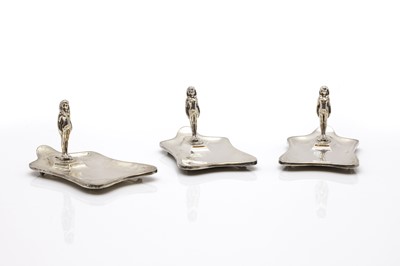 Lot 23 - A set of three silver ashtrays