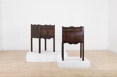 Lot 209 - A pair of George III-style mahogany night tables