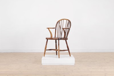 Lot 384 - A fruitwood and elm Windsor chair