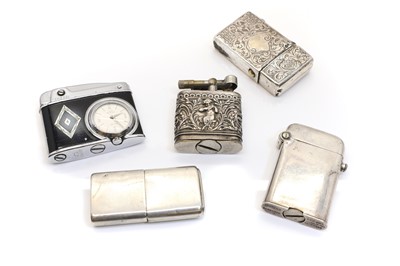 Lot 73 - A group of silver lighters